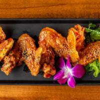 Crazy Wings · Thai style of buffalo whole wings. Sweet chili sauce.