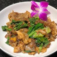 Pad See Eew · Chicken or shrimp. Classic stir-fried flat rice noodle with egg and Chinese broccoli. Season...