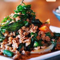 Basil · Chicken or shrimp. Most favorite street dish! Stir-fried with minced garlic, fresh chili, on...