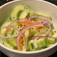 Cucumber Salad · Fresh cucumber with carrot and red onion tossed with Bangkok street sweet dressing.