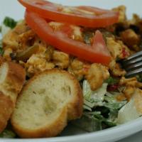 Chicken Caesar Salad · Romaine, Parmesan, shrimp, croutons, Caesar dressing.
