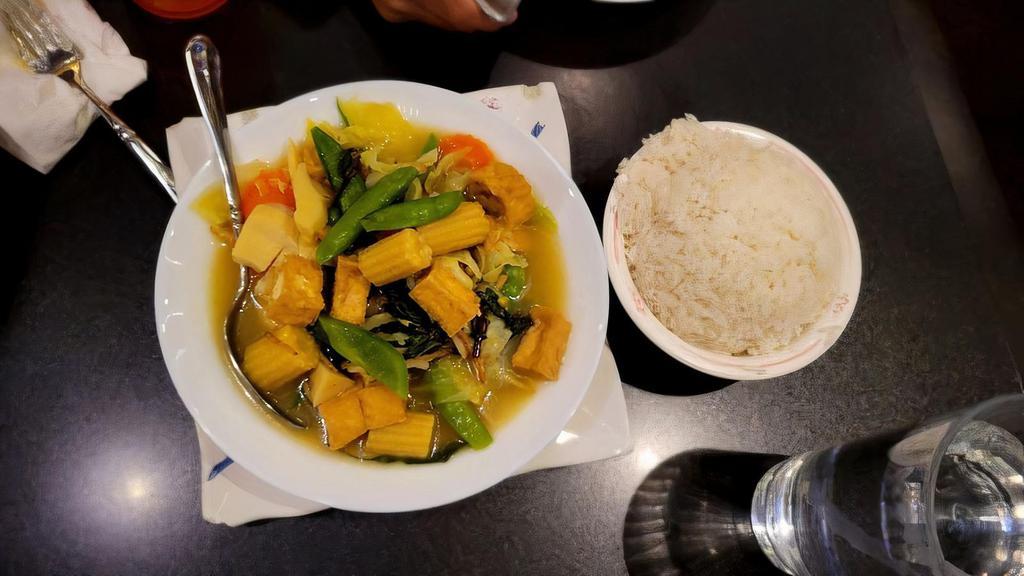 Jungle Curry · One of Thailand's curries without coconut milk. Lighter but strong with bold flavor. Bamboo shoots, bell pepper, carrots, baby corn, sweet pea, zucchini, mushrooms, kachai, and chili paste.