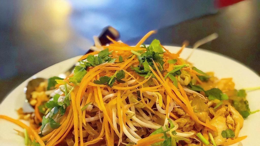 Pad Thai · Stir fried thin rice noodles, house pad Thai sauce, and egg topped with carrots, bean sprouts, green onion and crushed peanuts.