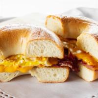 Breakfast Sandwich · Choice between ham, bacon or sausage. Served on a croissant or bagel with egg and cheese.