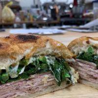 Fennel Crusted Pork Shoulder Sandwich · broccoli rabe, fennel pollen aioli, provolone