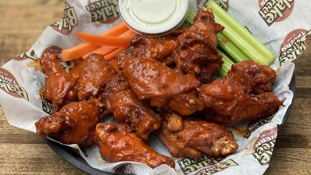 Wings Full Order  · 12 wings tossed in your choice of mild buffalo, spicy buffalo, asian ginger, honey chipotle bbq, north carolina bbq, lemon pepper dry rub, cajun dry rub, or Old Bay dry rub.  Nested with celery, carrots, choice of homemade bleu cheese or ranch or jalapeno ranch dressing.