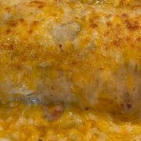 Smothered Burrito · Carne asada or grilled chicken, traditional pork green chile, refried beans, Cheddar, Jack, ...