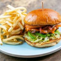 Blackened Chicken Sandwich · Bacon aioli, avocado, cheddar cheese, tomato, shredded lettuce & pickled red onions with fries