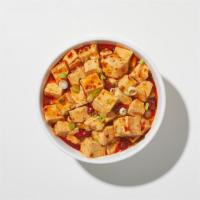 Mapo Tofu · Tofu, peas, carrots, onions, straw mushrooms in a spicy chili sauce.