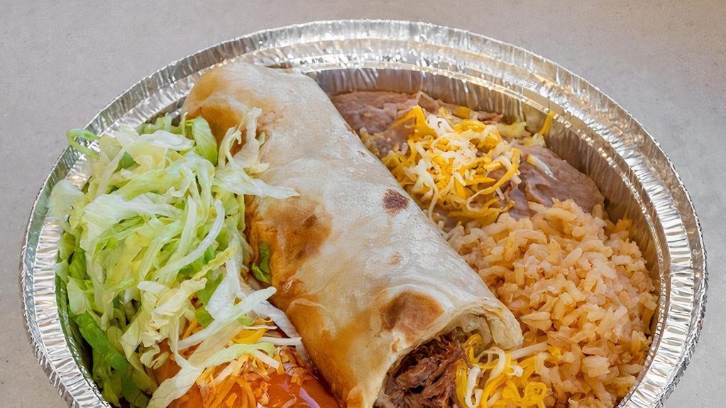 Shredded Beef Burrito & Enchilada · Served with rice and beans.
