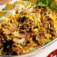 Chicken Biryani · (GF) Hearty vegetables/meat and rice casseroles cooked with flavorful herbs & spices. Served...
