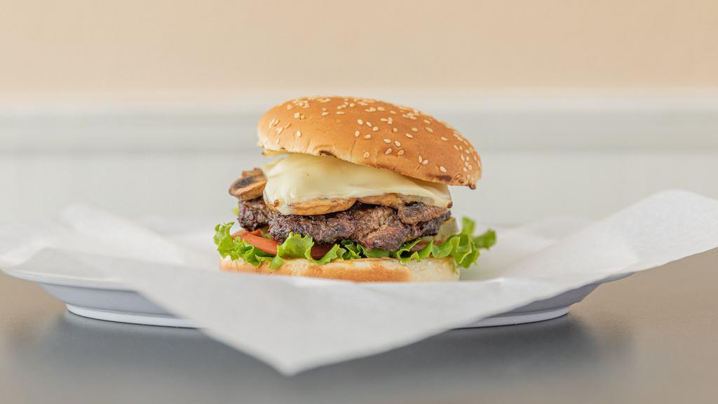 Mushroom Swiss Burger · Served with lettuce, tomato onion, mushroom, and swiss cheese.