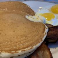 Buttermilk Pancake Platter · Trust us, it's great! Two pancakes and two eggs served with sausage patty, sausage links, an...