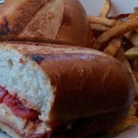 Yanni'S Sub · Pepperoni, canadian bacon, salami, pizza sauce, and mozzarella cheese. Served on a large fre...