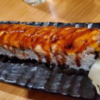 Seared Salmon Roll · Spicy Tuna, Avocado with Seared Salmon  on top
