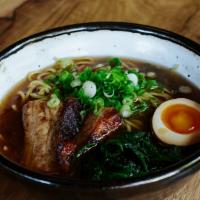 Shoyu Ramen · Chicken and fish broth. Topped with cha shu pork, spinach, and marinated egg.