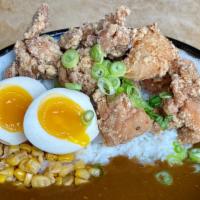 Fried Chicken Curry Rice Bowl · Shoyu infused all natural chicken served over rice with Japanese brown curry and egg.