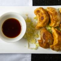 Potstickers (6) · Wok crisped flavored pork and vegetables wrapped in our specially made dumpling dough.