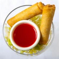 Crispy Spring Rolls (2) · Vegetarian wrapped rolls served with a sweet and sour dipping sauce.