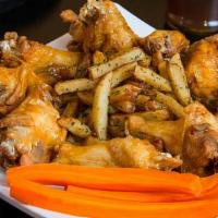 Chicken Wings · Served with carrot, celery and choice of dressing