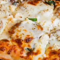 Guinea Pie Pizza · Meatballs, spinach, ricotta, white garlic sauce, and mozzarella.