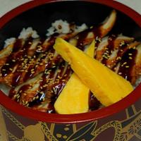 Unagi Don · Bowl of Sushi Rice, Sesame seeds,
BBQ Unagi 8pcs, Tamago 1pc, Eel Sauce,