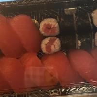 Salmon Lover · Eight pieces salmon nigiri & salmon mini roll.