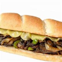 Unreal Cheese Steak · Unreal  Steak slices, (v) Provolone, sautéed onions and peppers on a vegan Harvest Moon Bake...