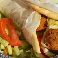 Falafel Wrap · Wrap with veggies, sauce, and falafel