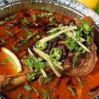 Lamb Shank Nihari · Braised lamb shank slow cooked in a stew of broth, served with a naan.