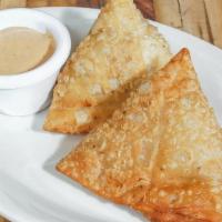 Samosa (2Pcs) · Savory fried pastry filled with potatoes, peas, and spices. Two pieces. Vegan friendly if ea...