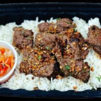 Beef Tapa · Served with rice and eggs.