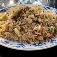 House Fried Rice · House fried rice includes diced duck, pork, shrimp, vegetables and egg.