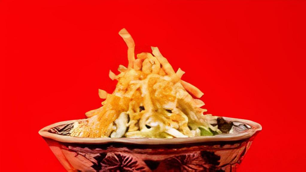 Cucumber Cabbage Salad · Sliced cucumbers, cabbage, cilantro and peanuts tossed in soy-ginger vinaigrette. Topped with crispy wonton strips. Contains PEANUTS.