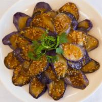*V9. Eggplant In Hot Garlic Sauce · Hot & spicy.