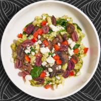 Pesto Mastah Mac · (VEG) Made with fresh spinach, olives, mushrooms, and peppers cooked in a creamy blend of pe...