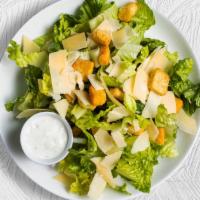 Creamy Caesar Salad · Crispy fresh lettuce, parmesan cheese, topped with house made dressing