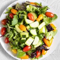 House Salad · Mixed greens and fresh tomatoes drizzled with balsamic dressing.