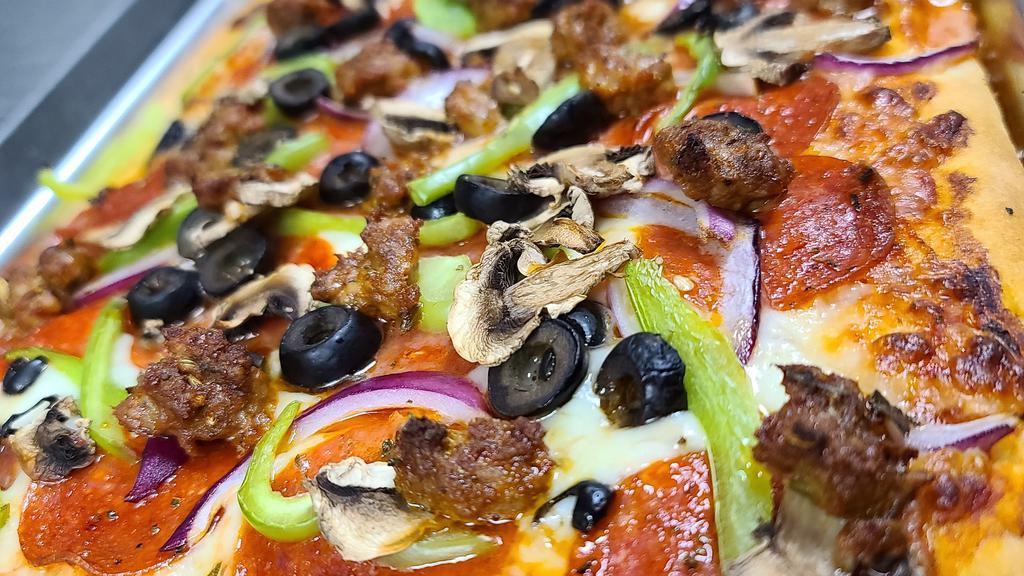 Doggy Style · Pepperoni, sausage, red onions, green peppers, white mushrooms, black olives.