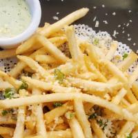 Truffle Fries · Vegetarian. Drizzled with truffle oil and topped with Parmesan cheese. Served with jalapeño ...