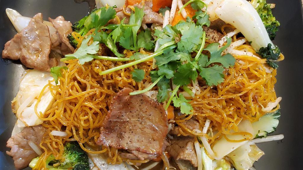 Stir-Fried Egg Noodle · Stir-fried egg noodle stirred with carrots, broccoli, onions, bok choy, cabbage, and your choice of protein.