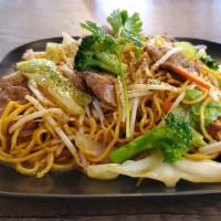 Chow Mein · Stir-fried egg noodle stirred with chow mien sauce,  carrots, broccoli, onions, bok choy, ca...