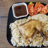 Fried Chicken And Rice · Choice of white rice or fried rice. served with a deep fried chicken leg and house made sauce.