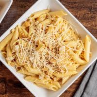 Baked Mac Mac · Penne pasta tossed in a creamy cheese sauce finished with toasted breadcrumbs and parmesan c...