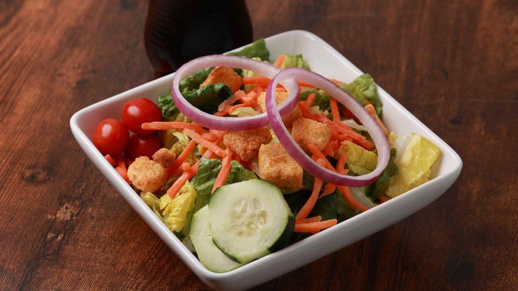 Side Kick Salad · Romaine, grape tomatoes, red onions, cucumbers, shredded carrots, and croutons. Served with your choice of dressing.