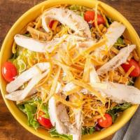 Southwest Chicken Salad · Romaine, grilled chicken, shredded mixed cheese, black beans & roasted corn, black olives, g...