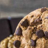 Chocolate Chunk Cookie · Overflowing with intensely flavorful chunks and morsels of sustainable chocolates grown in t...