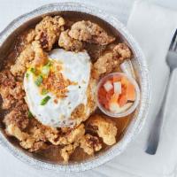 Adobo Moco · Fried chicken and egg covered with adobo gravy.