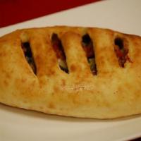 Create Your Own Calzone · Choose up to three fillings, sauce, and mozzarella cheese.
