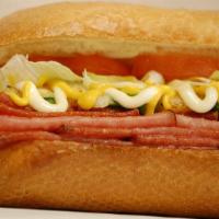 Italian Combo · Pepperoni, salami and Canadian bacon with green pepper, onions, mayo, mustard, lettuce, toma...